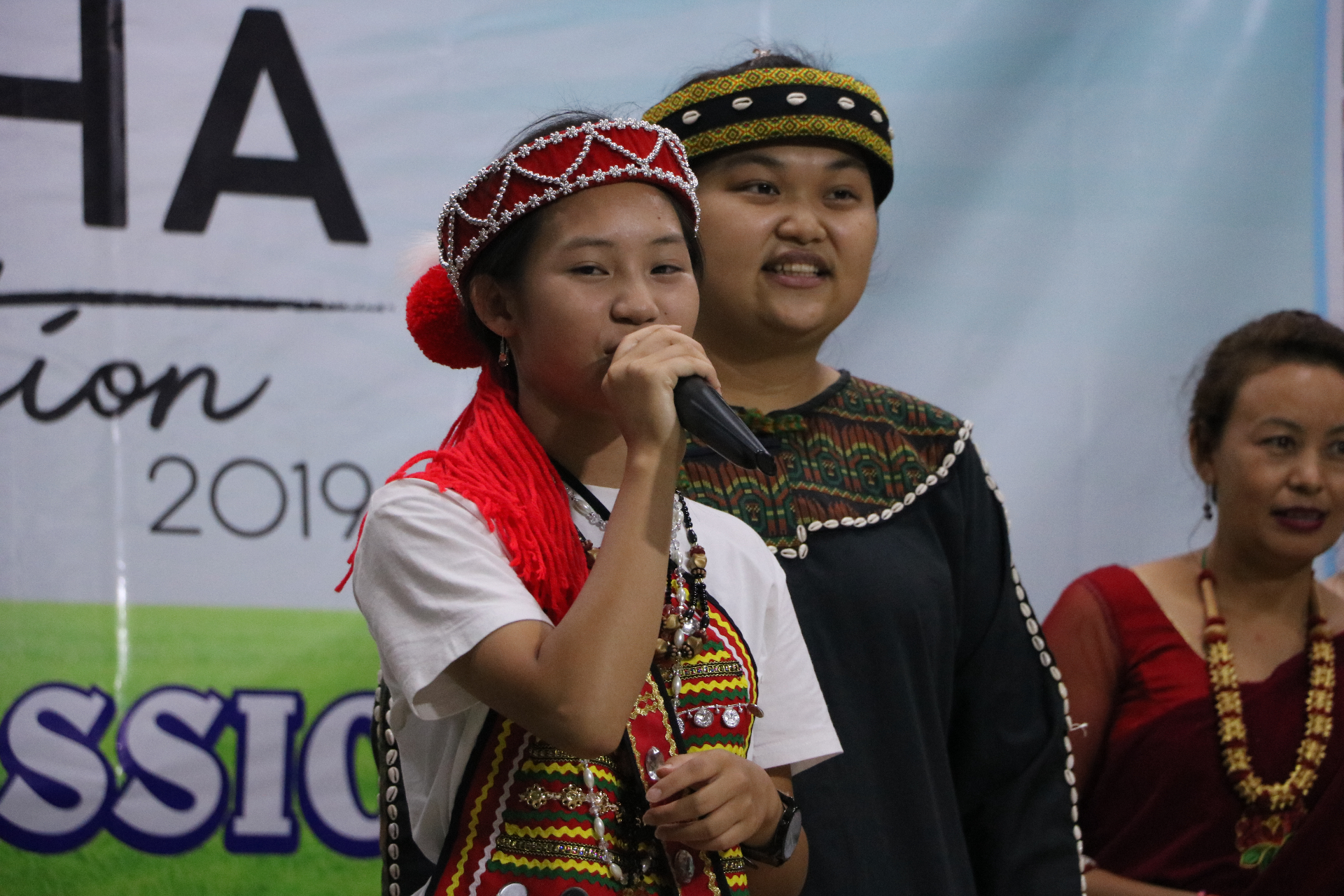 Young leader worshipping in traditional dress